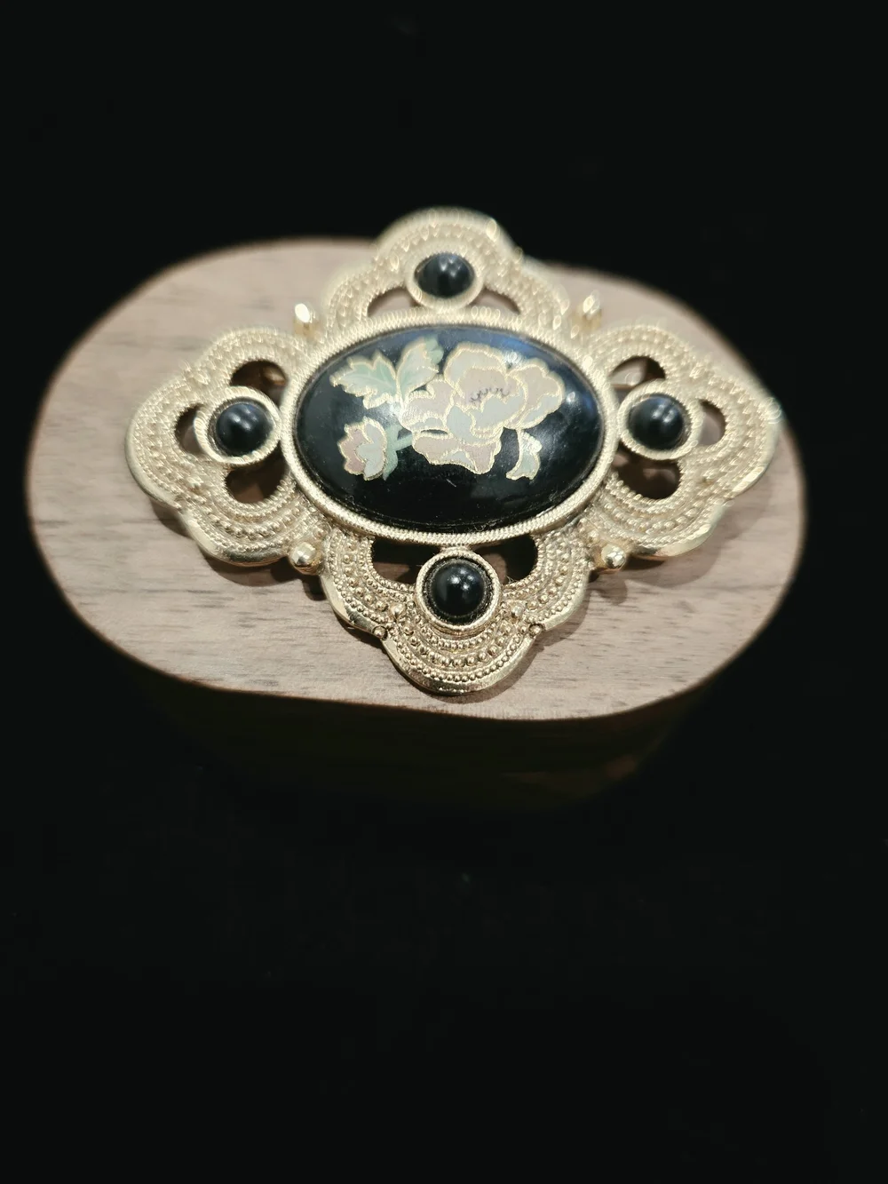 Vintage 1928 Gold-Tone Black Floral Enamel Brooch - Elegant Women’s Jewelry